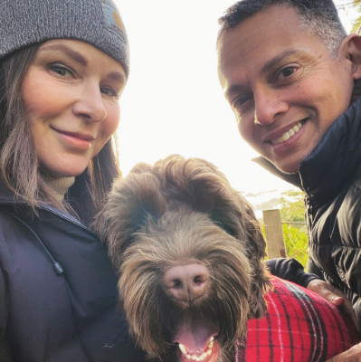 Jason and Anita Pires with their labradoodle Rosie. Photo from Anita’s Facebook page.