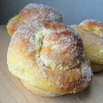 Ensaymada is a sweet and soft bread, topped with butter and grated cheese. Photo by Arnold Gatilao.